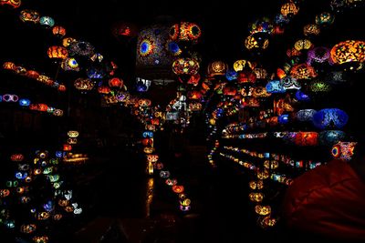 Illuminated lanterns hanging at night