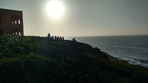 Silhouette of tourists on the beach