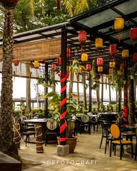 Empty chairs and tables in restaurant