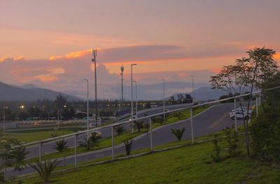 Scenic view of field against sky during sunset