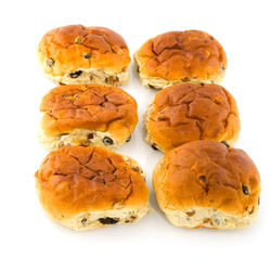 Close-up of pastries against white background