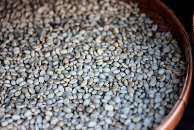 High angle view of coffee beans in container