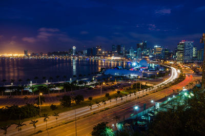 High angle view of light trails on road in city at night, luanda, angola, africa