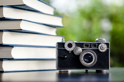 Close-up of camera on table