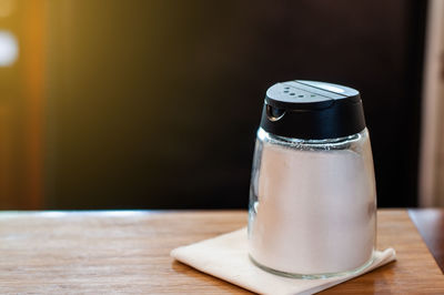 Close-up of coffee cup on table