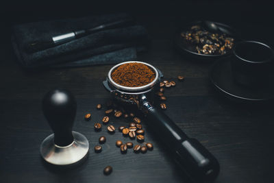 High angle view of coffee grinder on table