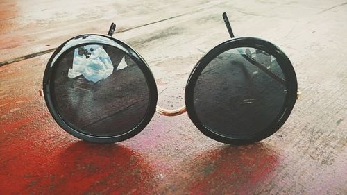 Close-up of sunglasses on table