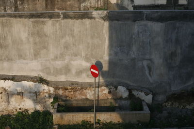 Stop sign against the wall