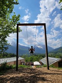 Scenic view of a swing in the mountains 