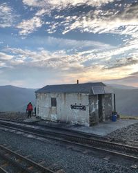 Train on railroad track against sky