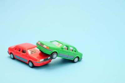 High angle view of toy car on blue background