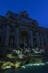Statue of fountain in city