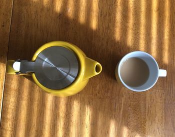 High angle view of coffee cup on table