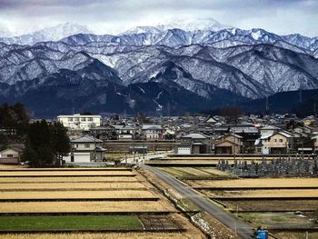 High angle view of railroad tracks against mountain range