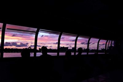Silhouette of trees against sky at sunset