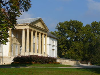 Lawn in front of house against clear sky
