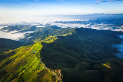 Scenic view of mountains and mist blue sky backgrounds chaing rai thailand 