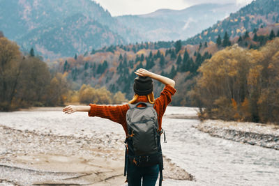 Rear view of man standing on land