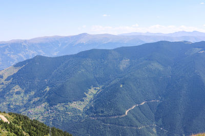 Aerial view of mountain range against sky