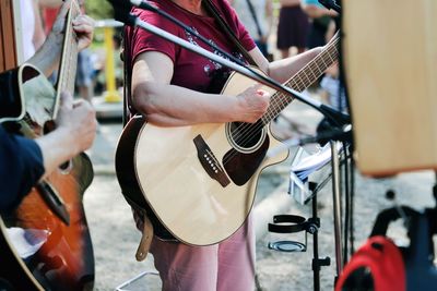 Group of people playing guitar