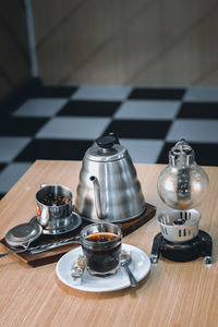 Close-up of coffee maker on table
