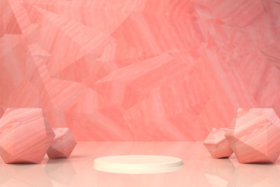 Close-up of pink umbrella on table