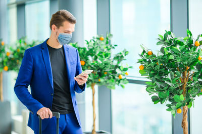 Young man using mobile phone