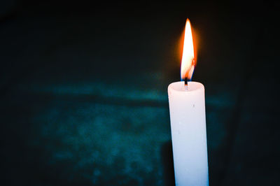 Close-up of burning candle