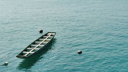 Boat moored on sea