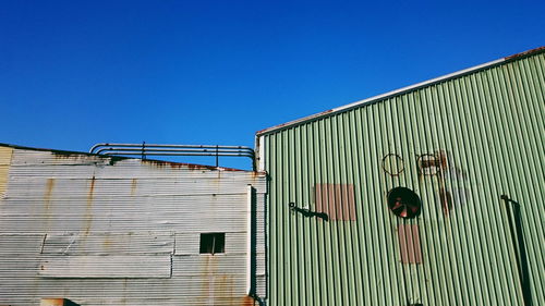 Metal structure against clear blue sky