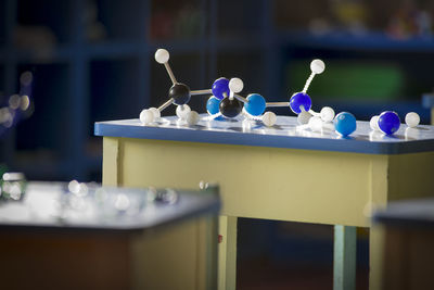 Molecular structure on table in classroom