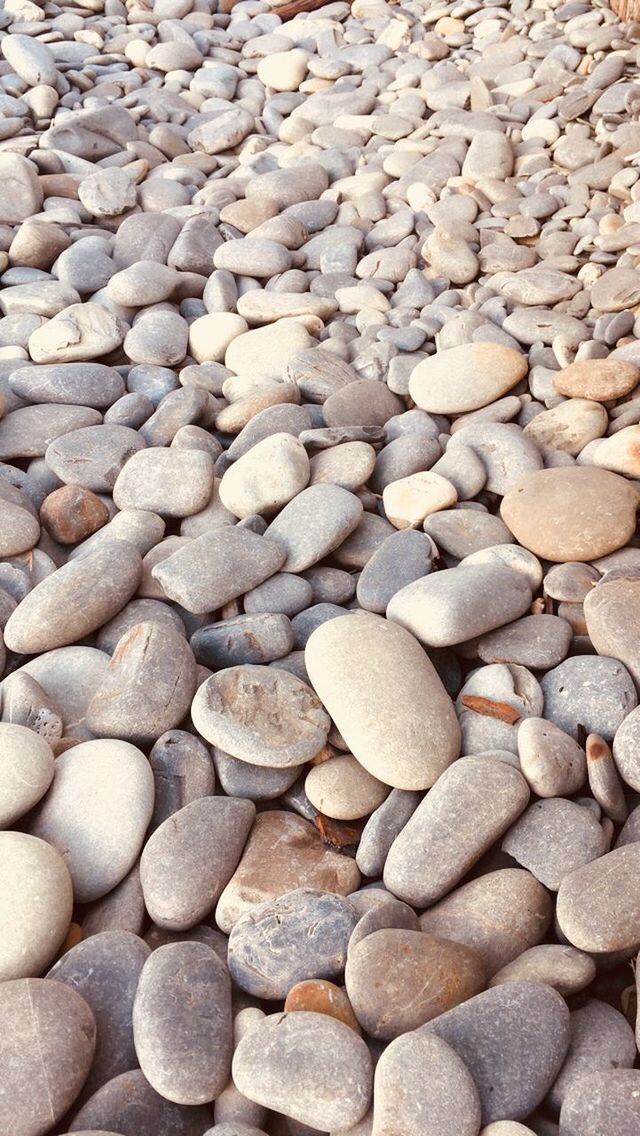 stone, large group of objects, pebble, rock, solid, stone - object, backgrounds, full frame, no people, abundance, textured, nature, close-up, high angle view, day, rock - object, beach, outdoors, land, still life