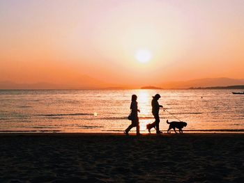 Scenic view of sea at sunset