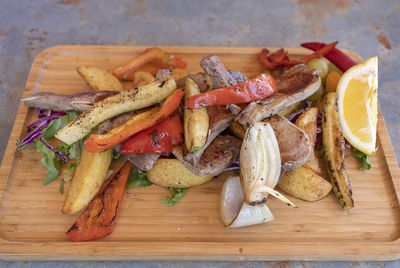 High angle view of vegetables on cutting board