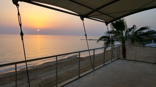 Scenic view of sea at sunset