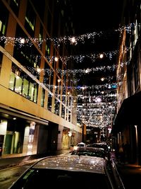 Buildings in city at night