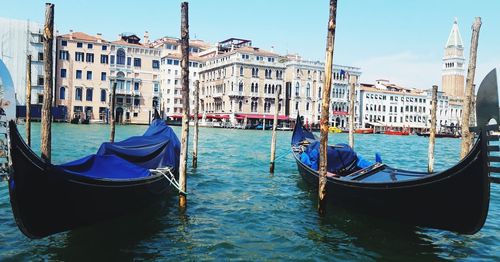 Gondolas moored in canal