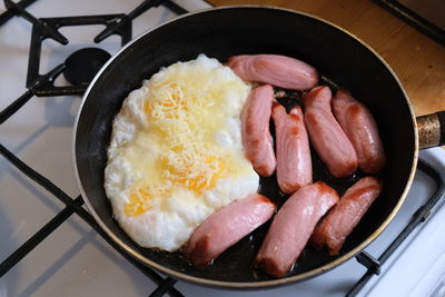 High angle view of meat in cooking pan