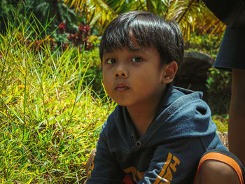 Portrait of little boy looking away