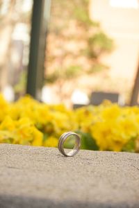 Close-up of yellow flower on table