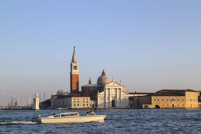 Church of san giorgio maggiore by grand canal against clear sky