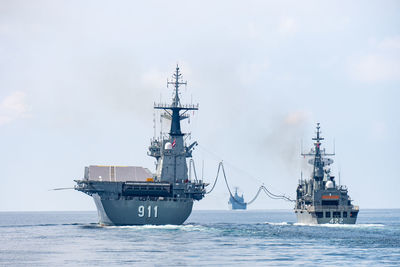 Ship in sea against sky