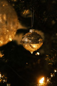 Close-up of illuminated light bulb