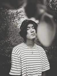 Portrait of young man looking away