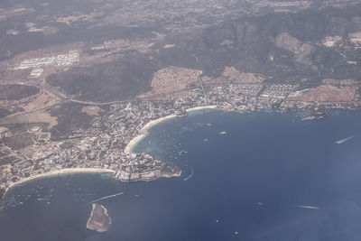 High angle view of cityscape and sea