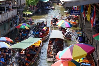High angle view of people standing in water