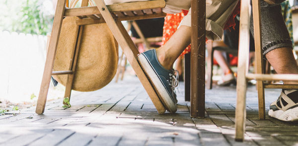 Low section of woman on chair