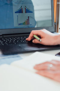 Man using laptop on table