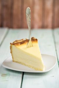 Close-up of cake slice in plate on table