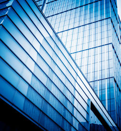 Low angle view of modern glass building